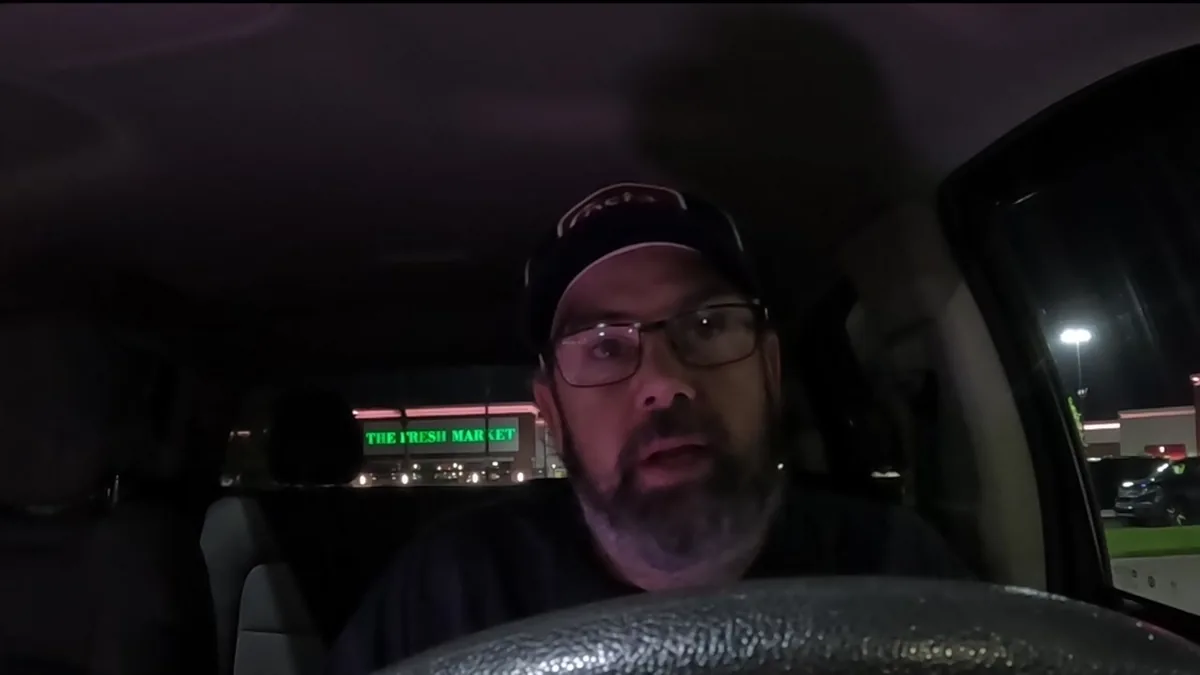 Derek waiting in his truck during a quiet Sunday shift