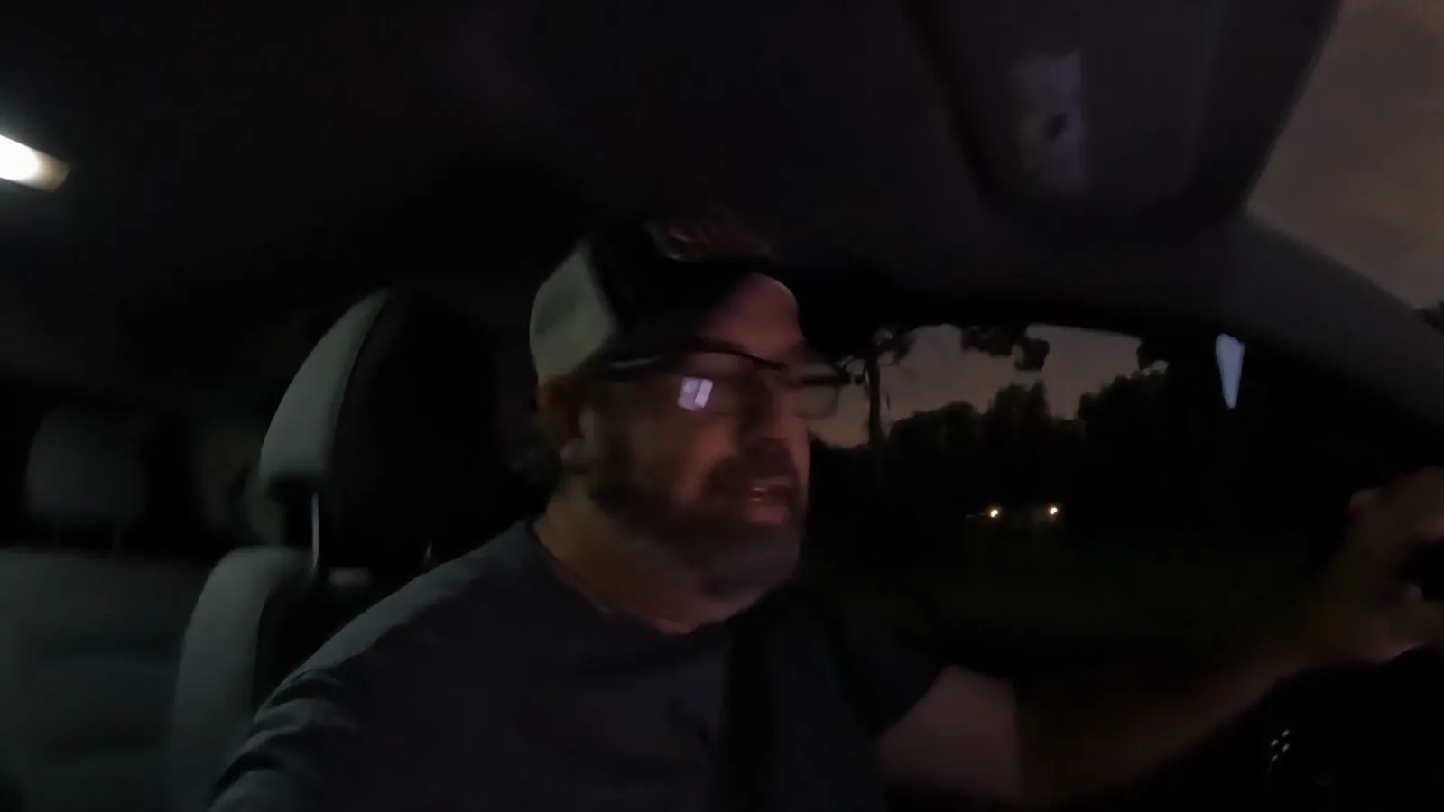 Derek driving back after a distant evening delivery