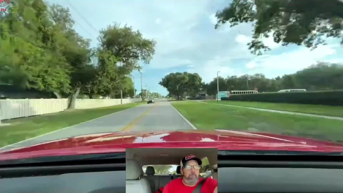 The road ahead during a delivery shift with Derek visible in the in-car camera